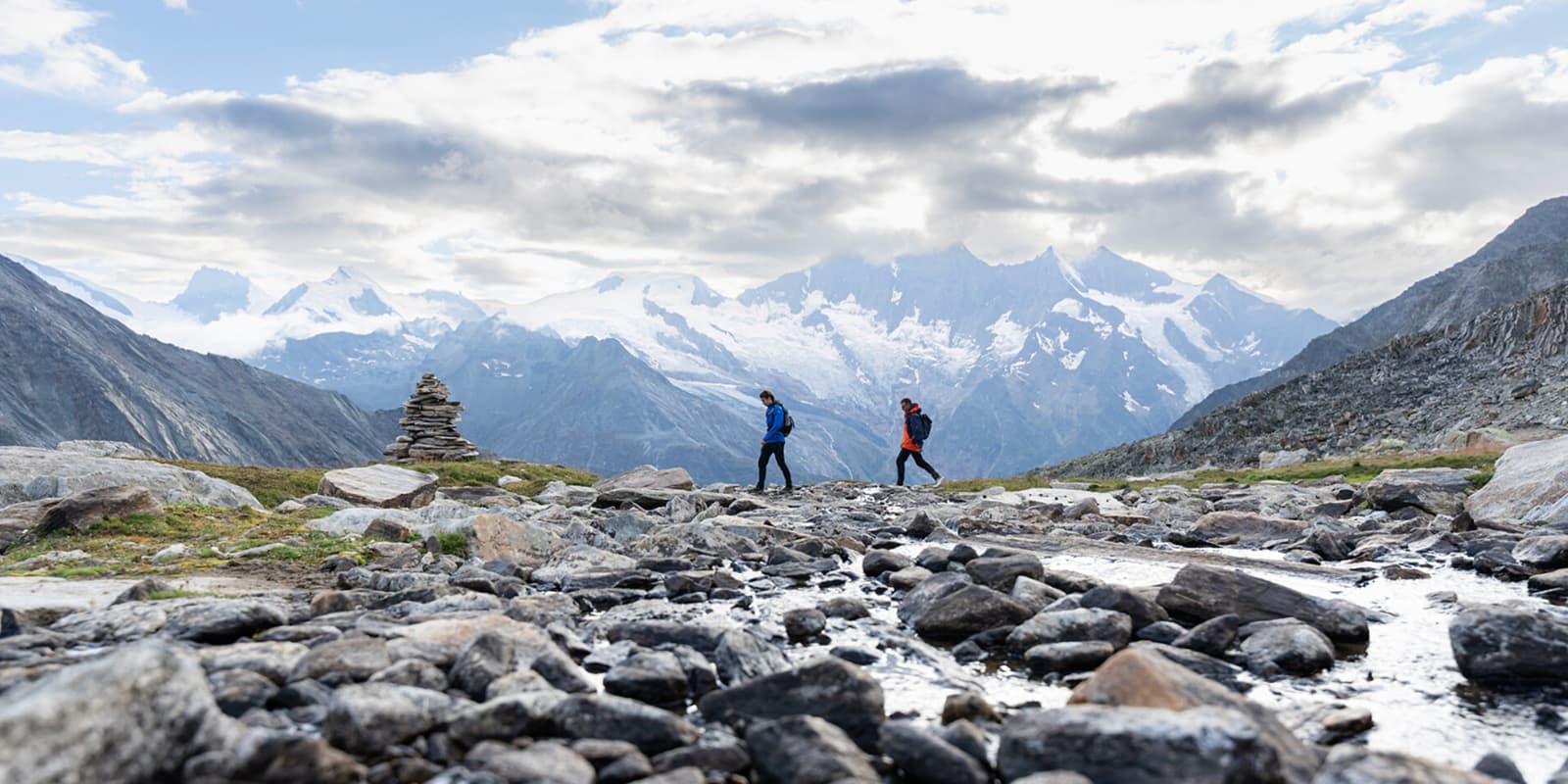two people hiking in Saastal Switzerland