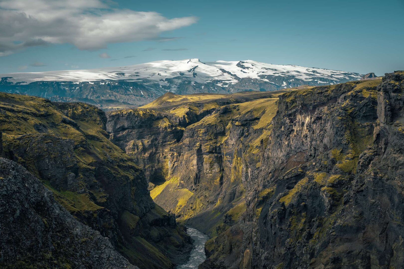 river running through mountain valley