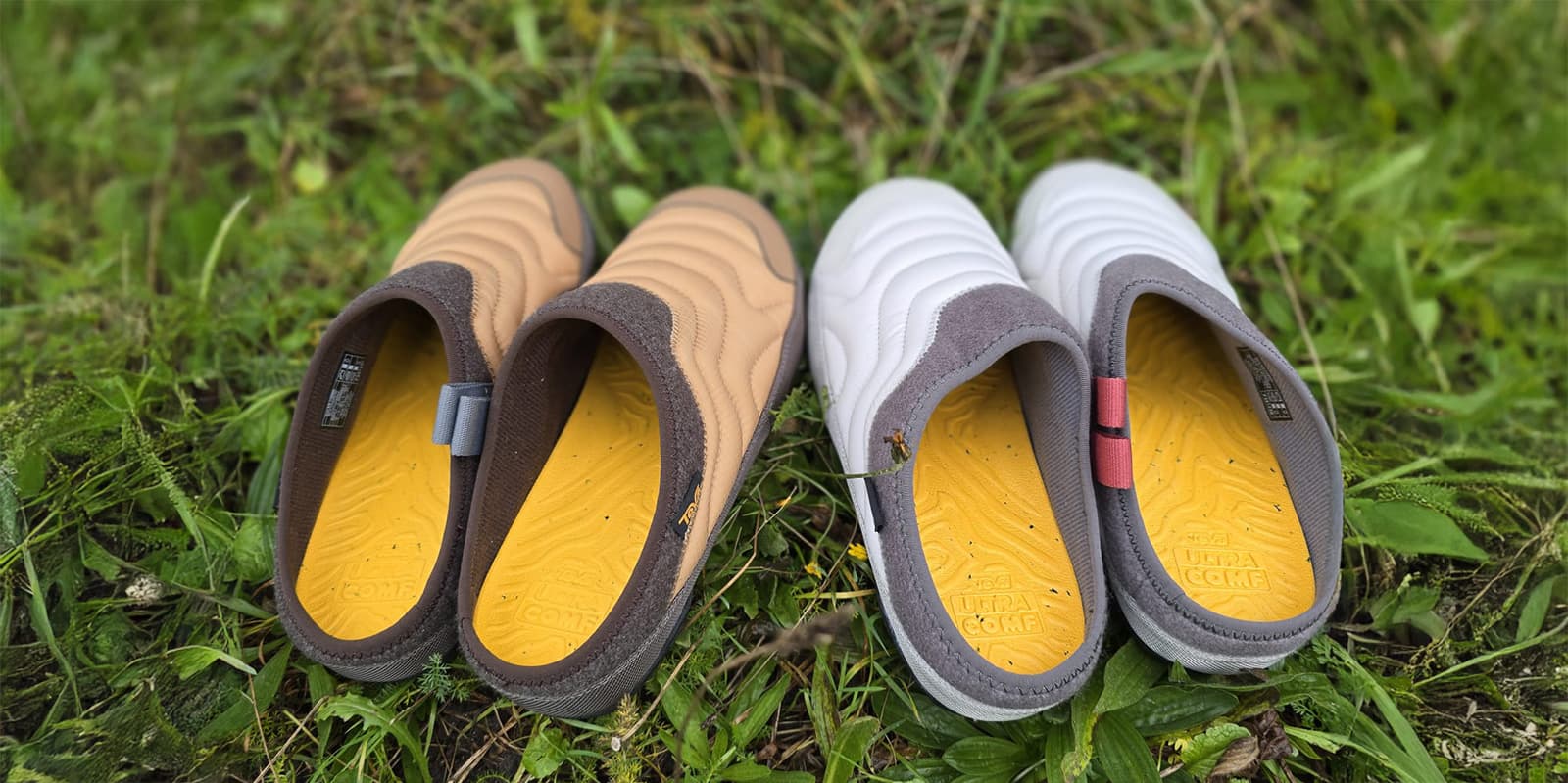 two pair of the Teva ReEmber Terrain shoes sitting in the grass